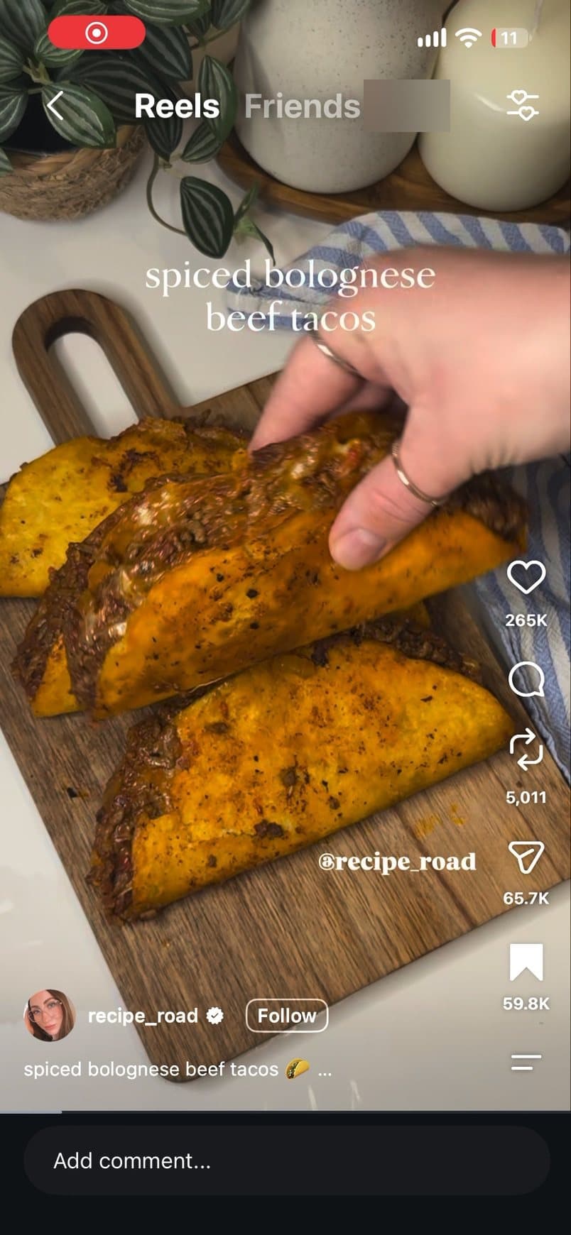 An Instagram reel with the share icon on the right side highlighted